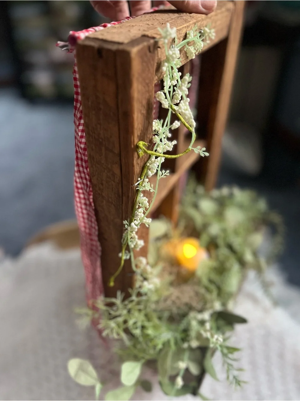 Rustic Windowbox Accent with Greenery and Soft Candle Light